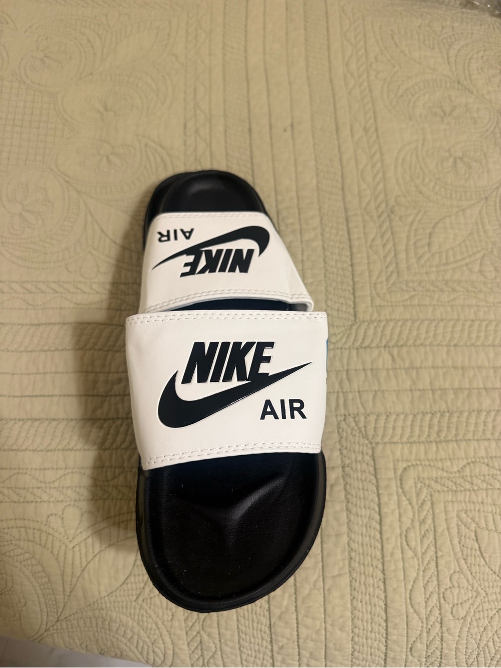 Nike White and Black Air Slide Sandals with Bold Logo